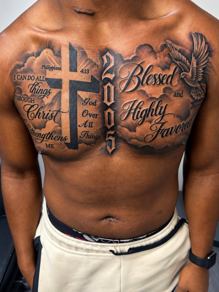 Detailed religious chest tattoo with a cross and dove on dark skin
