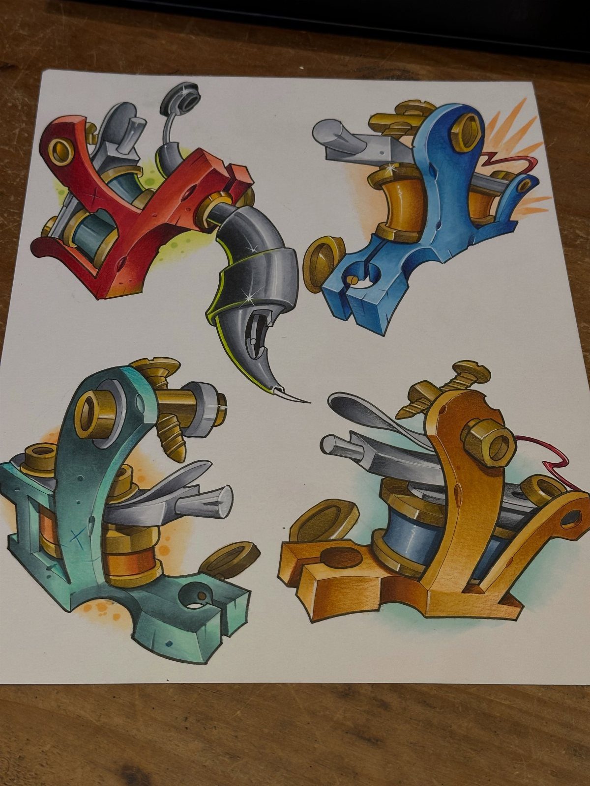 Four colorful stylized tattoo machine drawings on a white piece of paper.